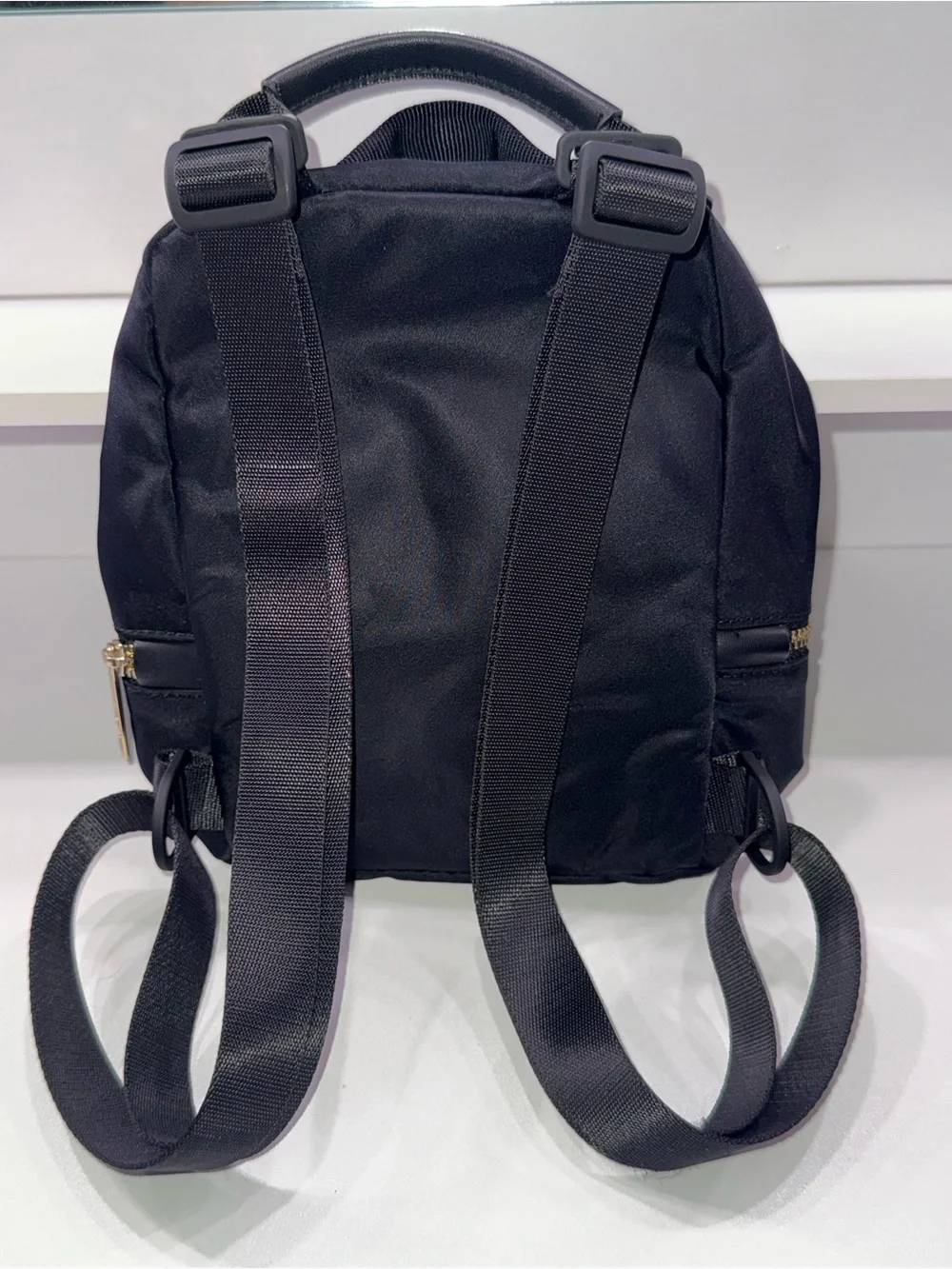 lululemon athletica Black Mini Backpack with Gold Zippers